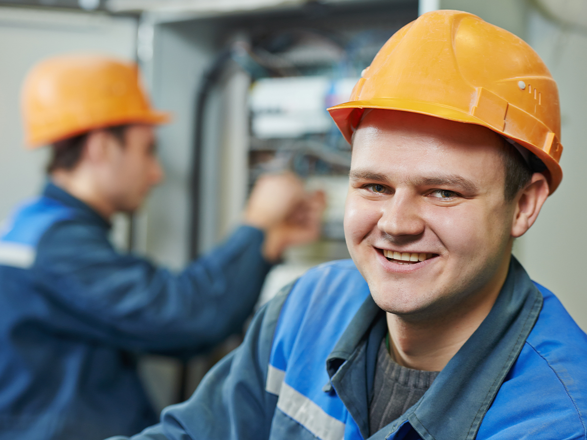 happy electricians on a job