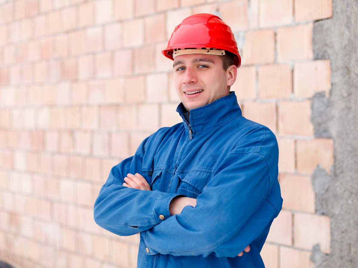 An electrician wearing a hard hat