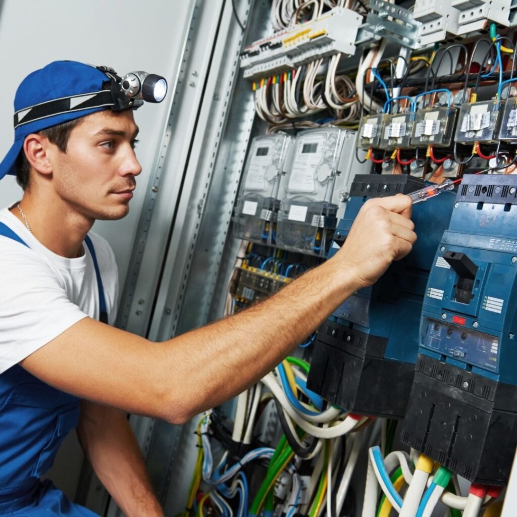 man working on electrical