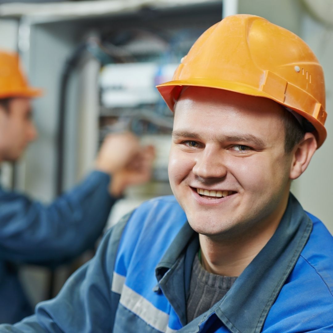 electrician smiling at the camera
