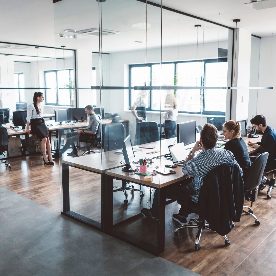 interior of an office space with employees working
