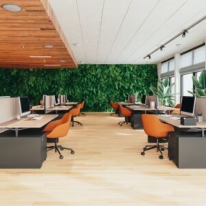 an office building with desktops at the desks
