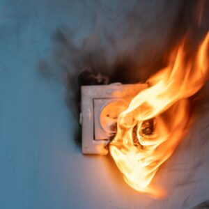 an electrical outlet on fire