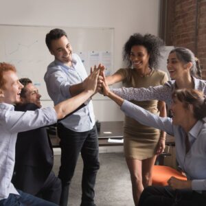 Coworkers high-fiving