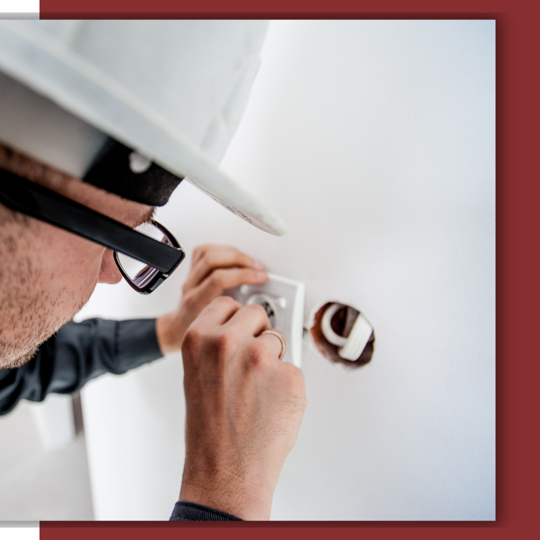 electrician working on electrical system