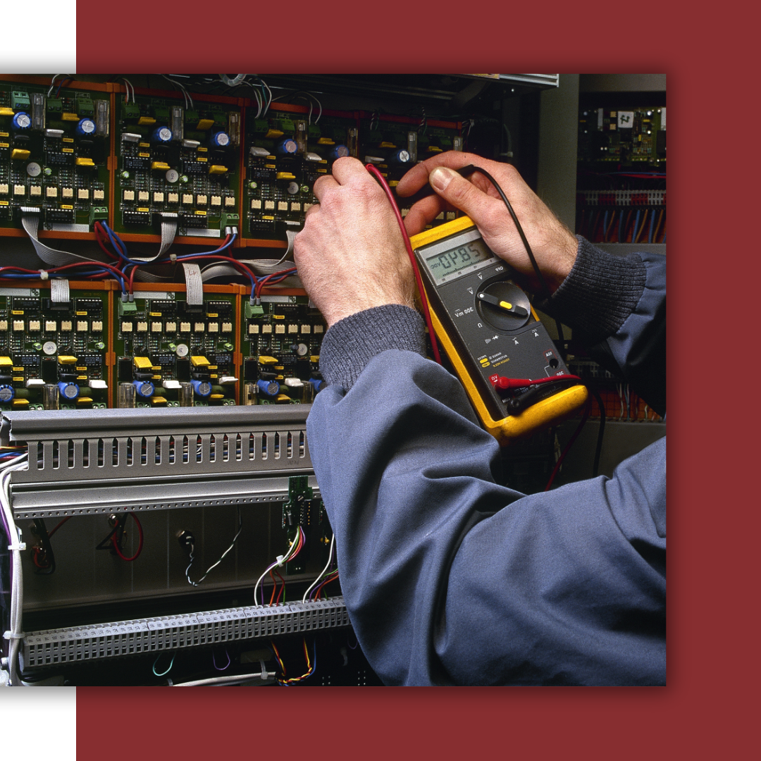 technician working on electrical panel